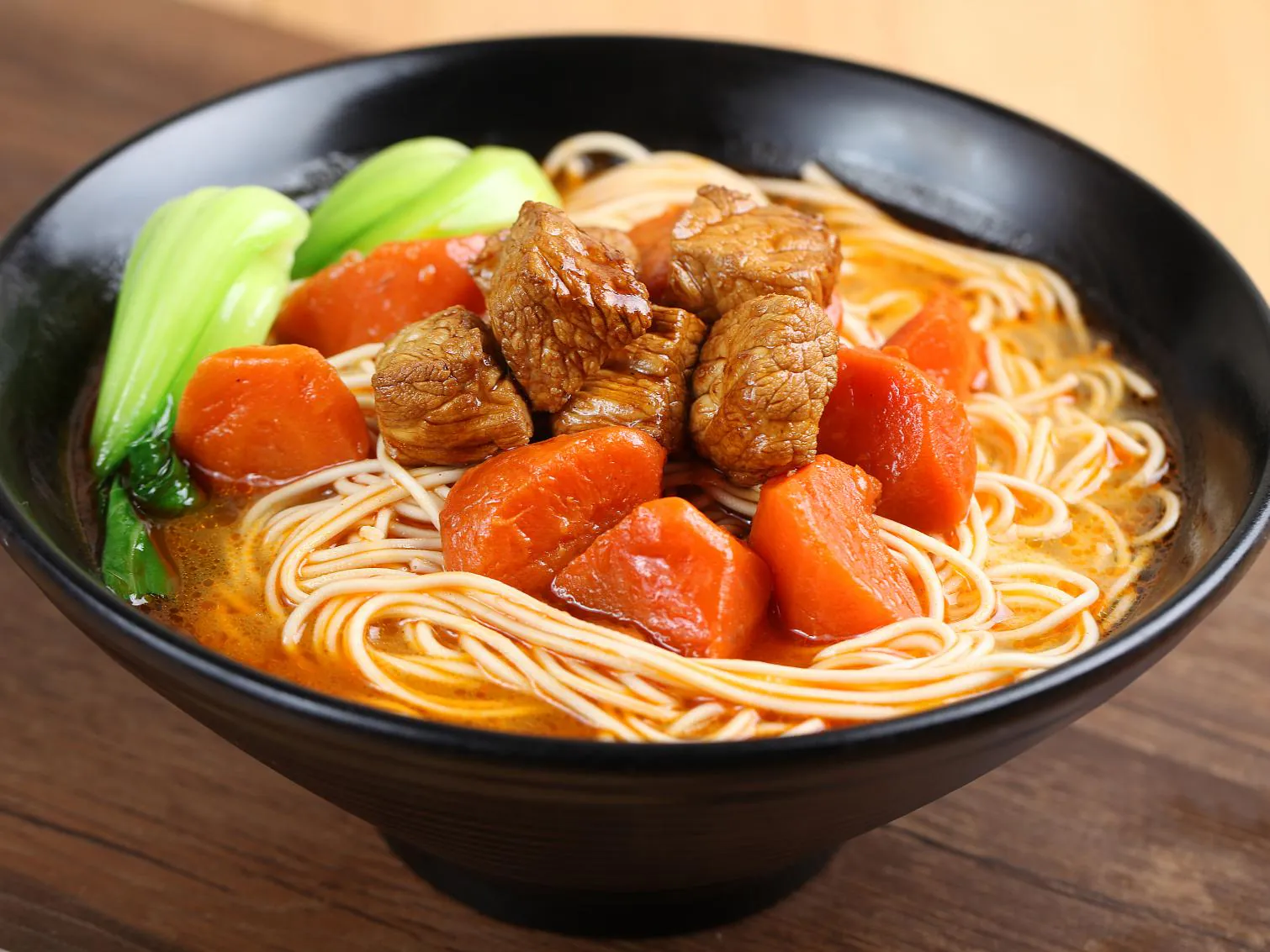 Noodle soup with tender beef, carrots and greens at A One Dumplings & Noodle Bar, a Chinese Restaurant in Bee Cave
